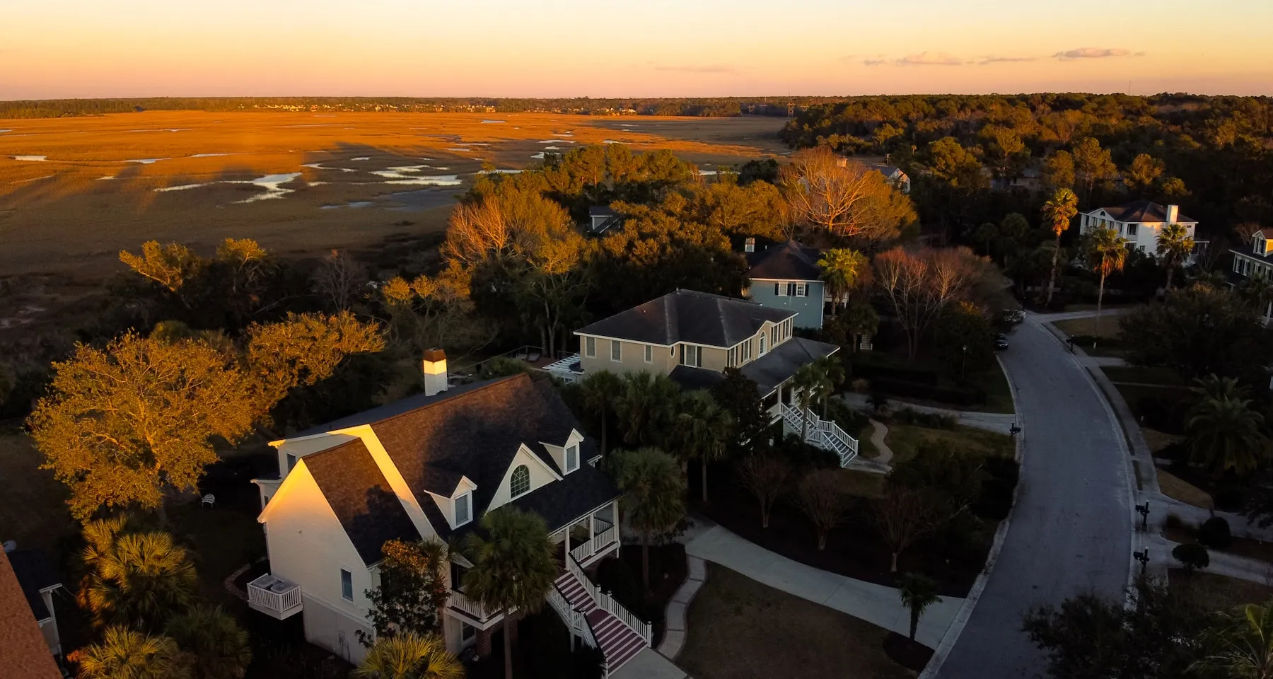 Aerial view of a residential neighborhood at golden hour